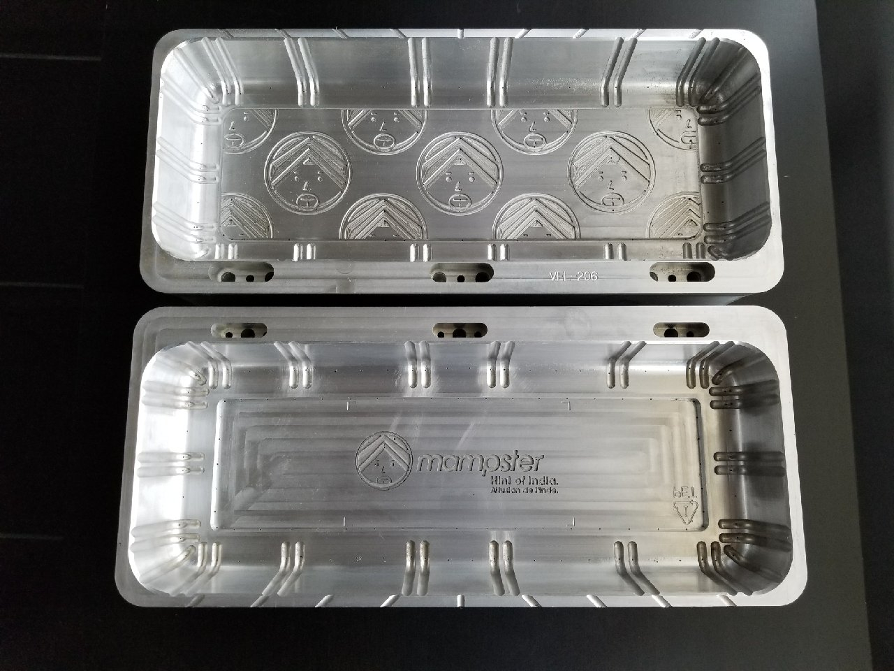 Matched pair of machined aluminum tooling trays