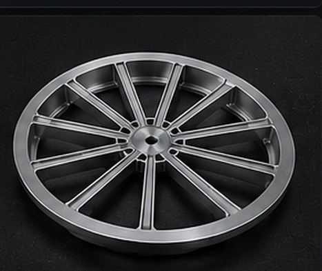 Machined spoked wheel with milled pockets between spokes